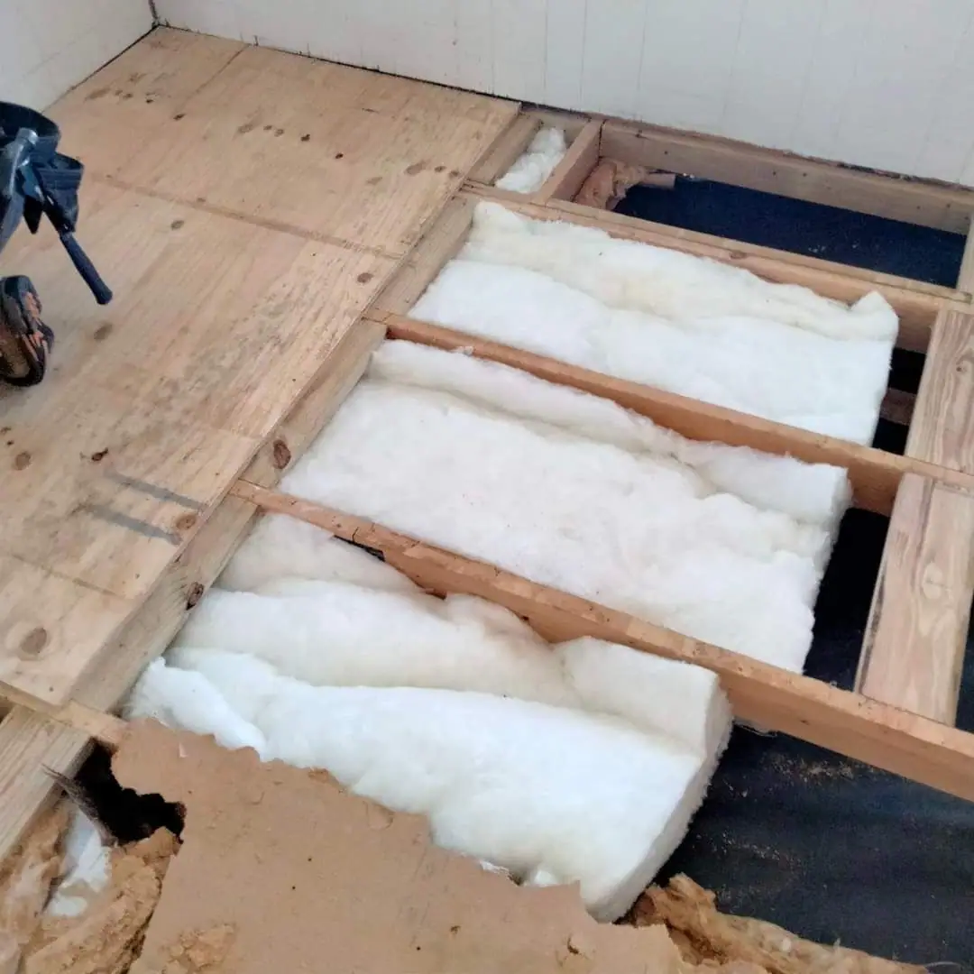New insulation between the joists before new plywood goes down over a soft spot