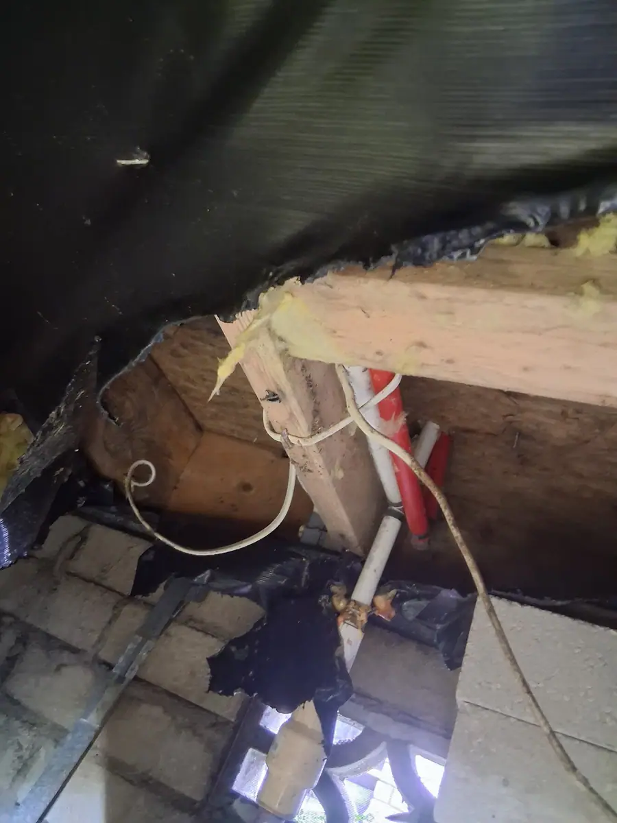 Belly opened up to the floor framing, water lines and wiring