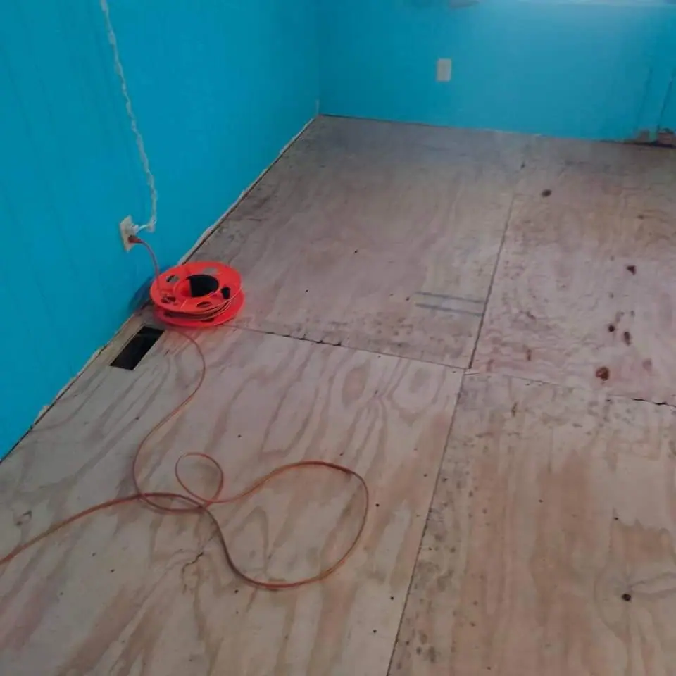 New plywood subfloor down in a room of a manufactured home