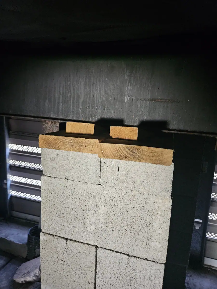 Stacked block piers under a manufactured home frame